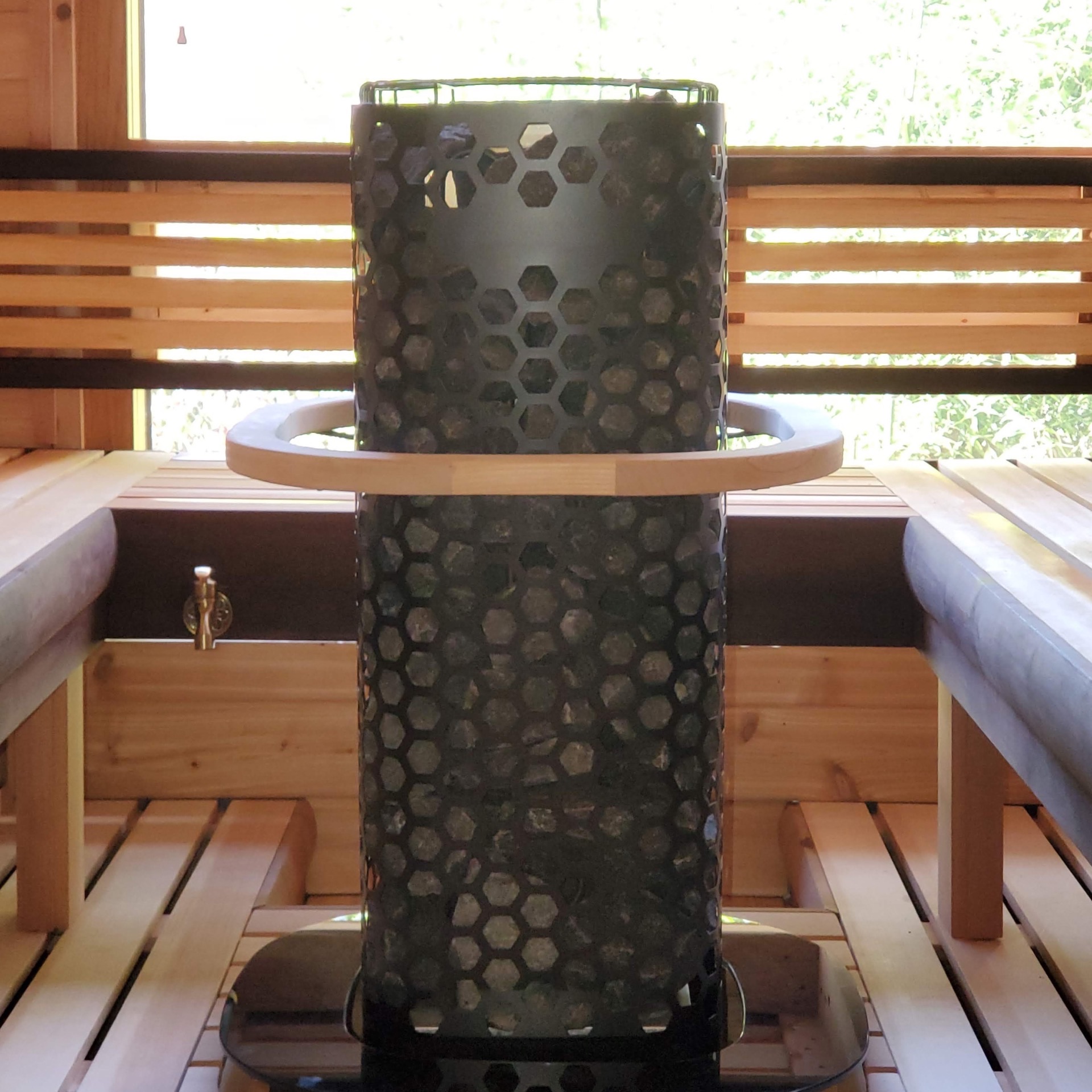 Hexagonal Harvia heater with sauna stones