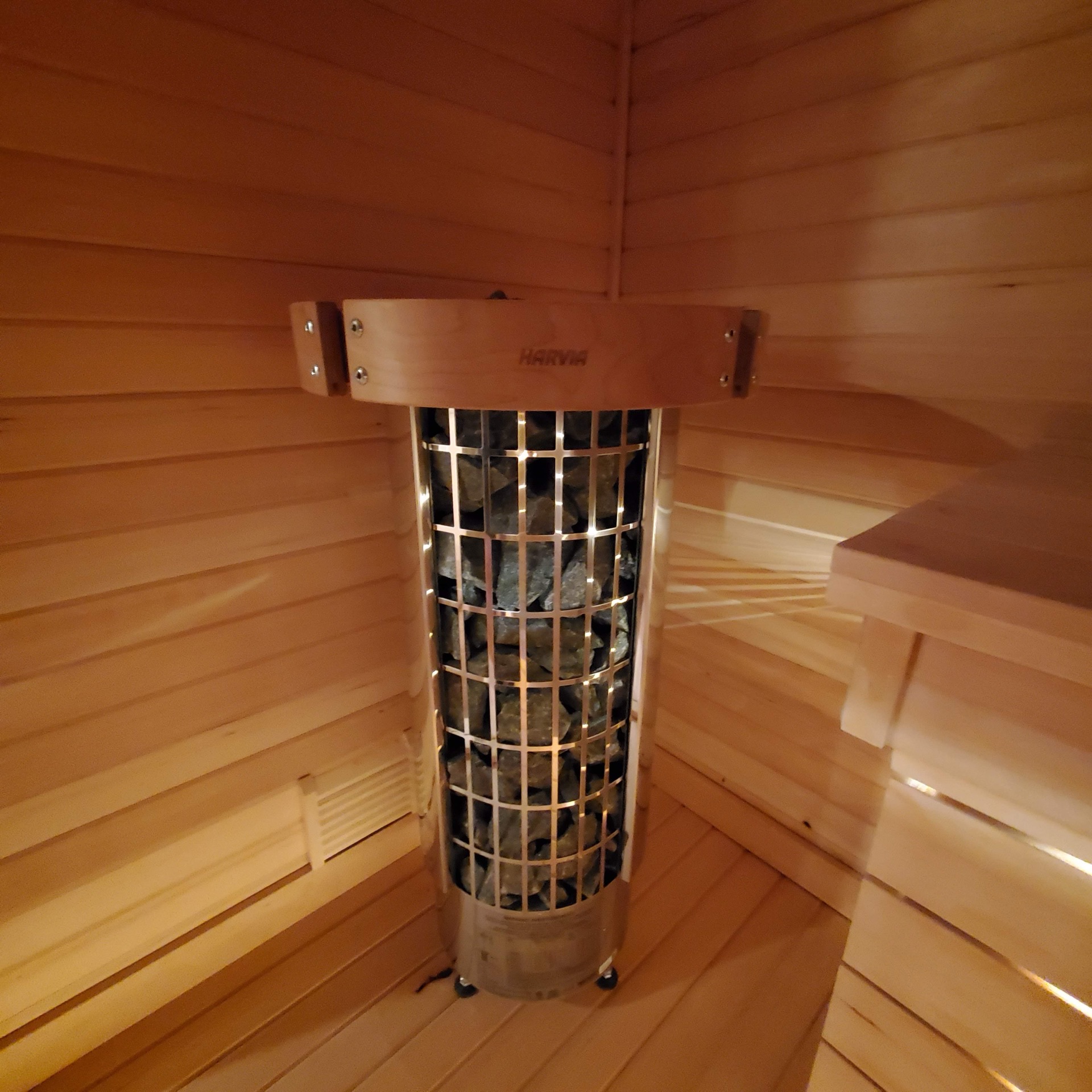 Harvia cylindrical heater in cedar sauna