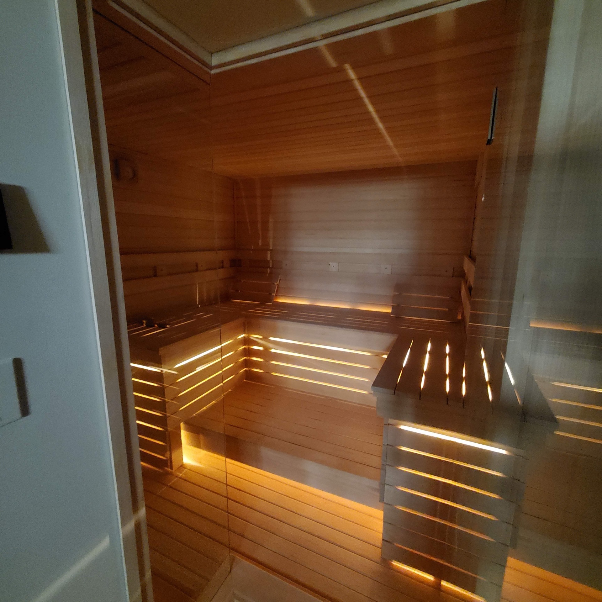 Cedar sauna interior with ambient lighting