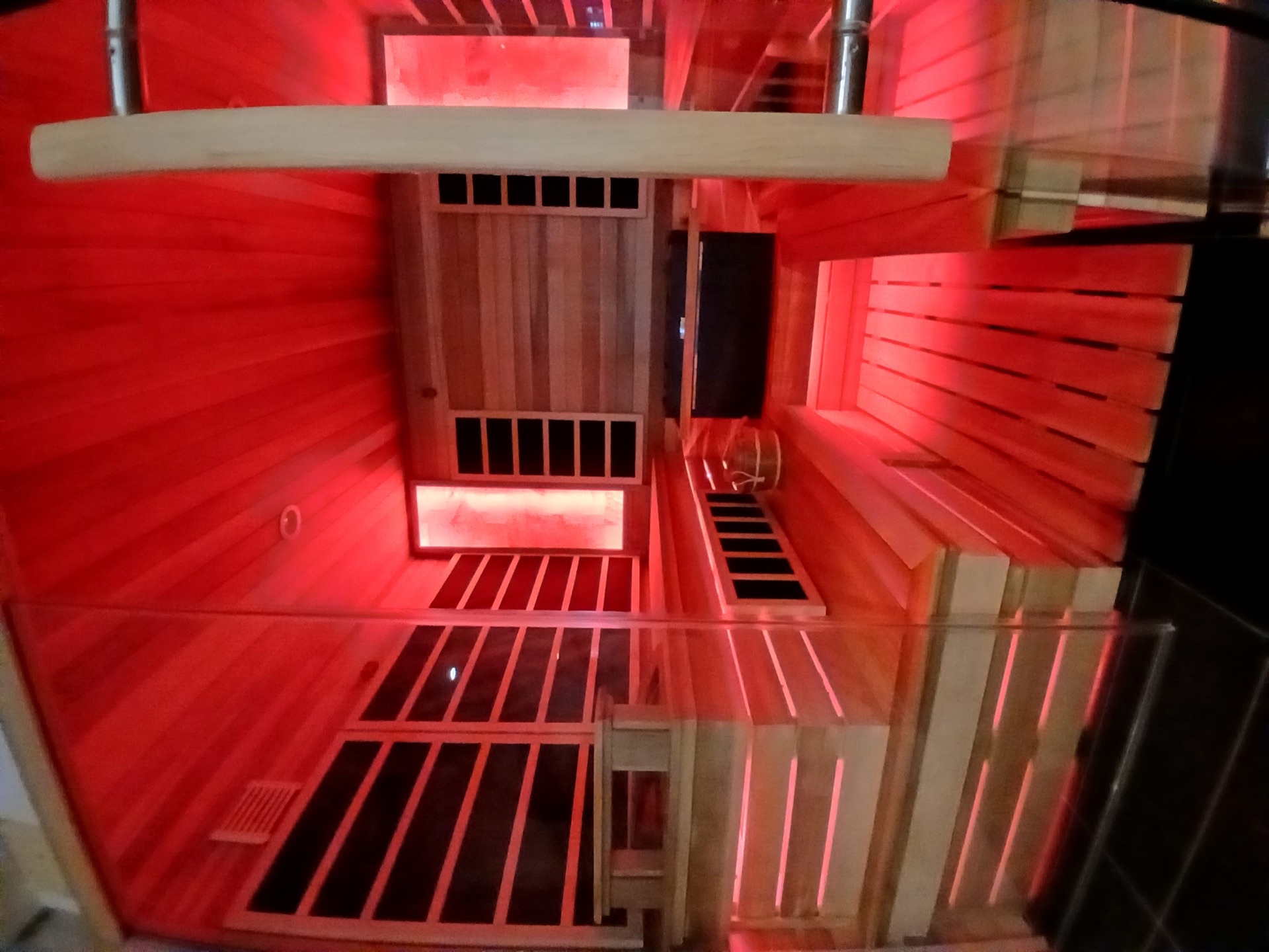 Sauna interior with green chromotherapy lighting