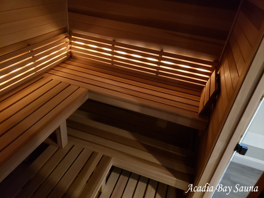 Cedar sauna interior with warm backlighting