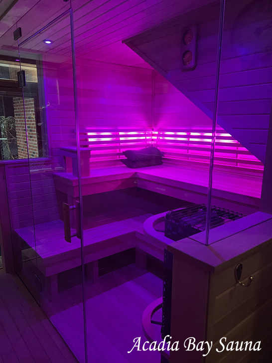 Custom sauna with purple chromotherapy lighting