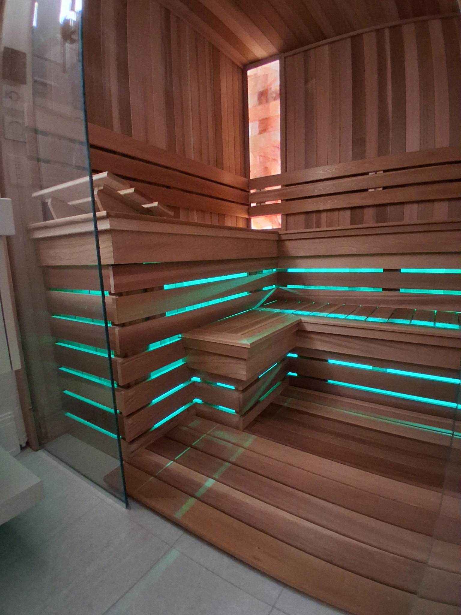 Cedar sauna with warm lighting